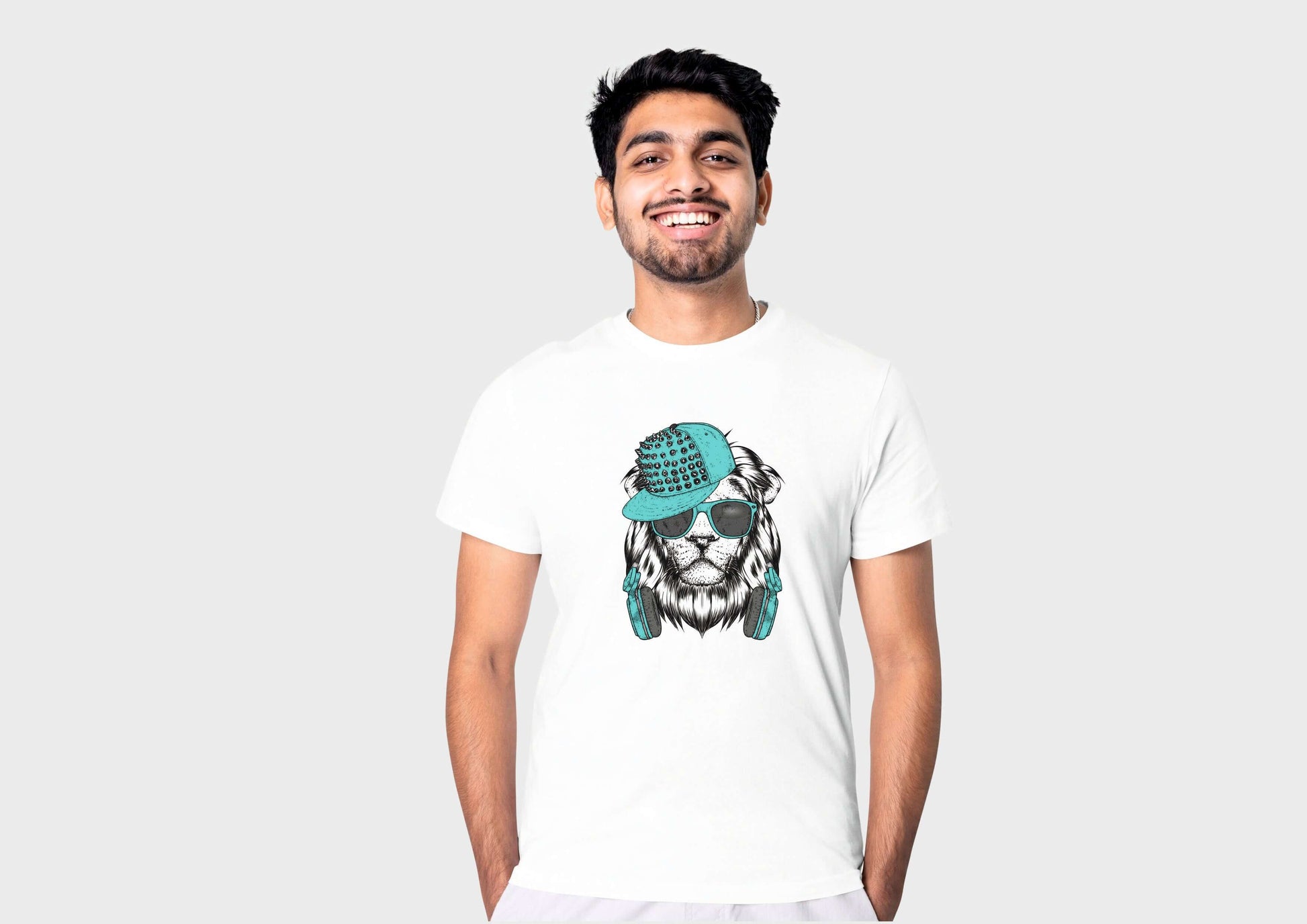 Man wearing white cotton t-shirt with lion graphic and hipster cap, showcasing stylish casual wear.