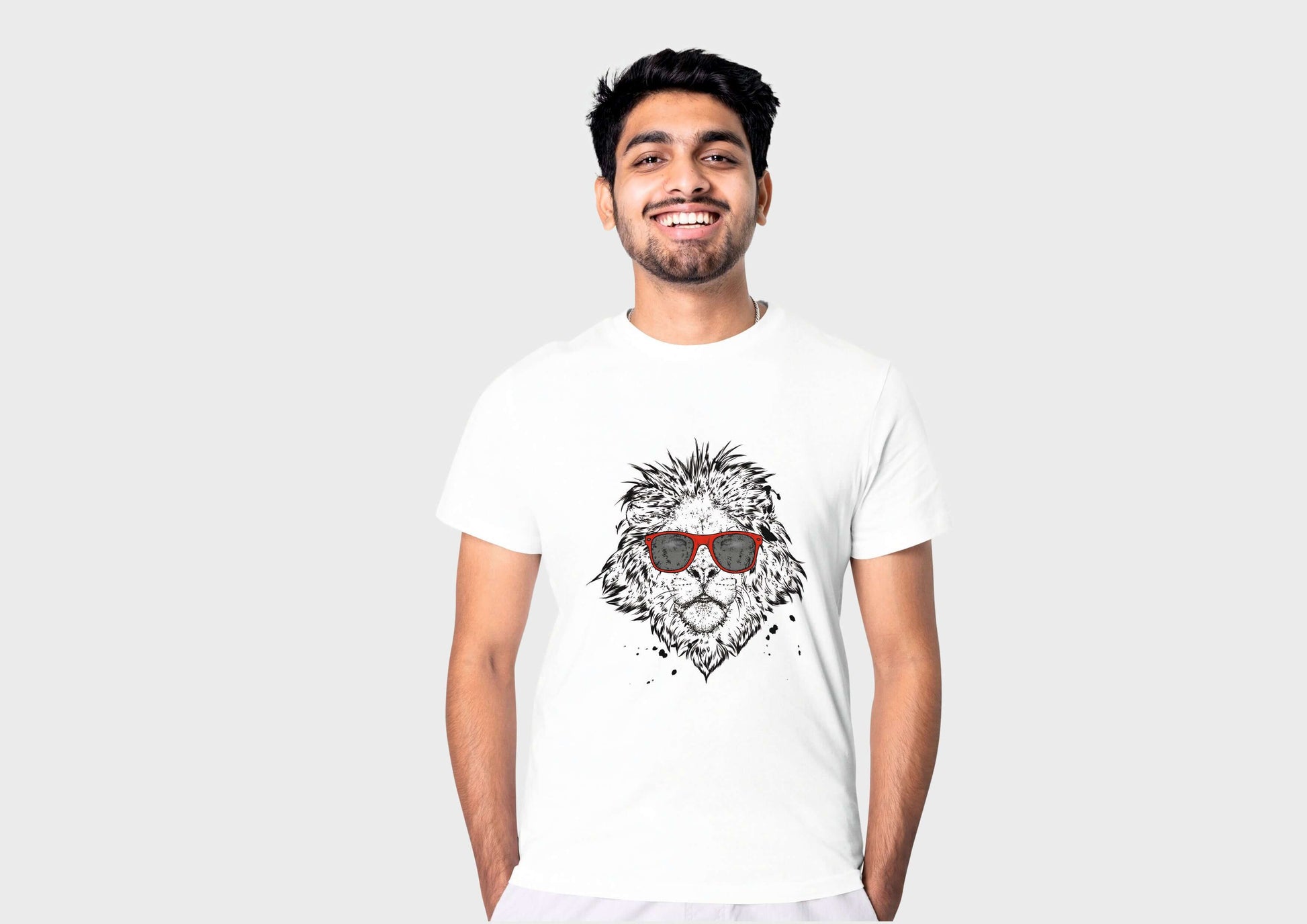 Man wearing a white cotton round neck t-shirt featuring a lion with sunglasses design, perfect for a stylish everyday look.